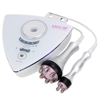 China Portable 2 in 1 Mini RF Device RF Face Lift Machine Massager Lipo RF Facial Body Slimming Machine for sale