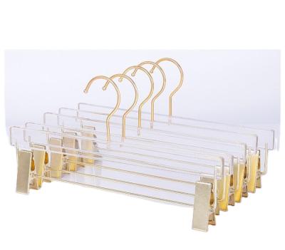 China Clear+Clear Acrylic Pants Hanger Metal Hook Pants Hanger for Skirts with Gold Clips for sale