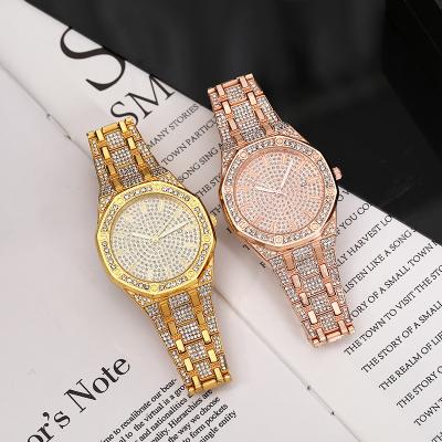 China Luxury Men's Diamond Alloy Watch Fashion Calendar Day/Date Women's Quartz Watches for sale