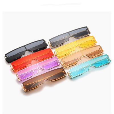 China New Small Frame Ladies One Piece Rimless Sunglasses Purple Metal Frame Mirror Glass Sunglasses for sale