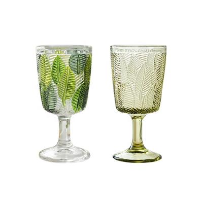 China Leaf Embossed Design 300ml 10oz Glass Leaves Embossed Custom Vintage Goblet Retro Champagne Wedding Goblets Wine Juice Cup Blue Green Glasses for sale