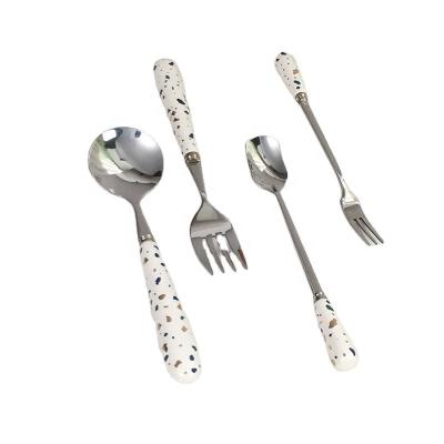 China Nordic Household Decal Tableware Matte Stocked Insti Serves Forks Gravel Pattern Handle Stainless Steel Fork And Spoon Ceramic Spoon Set for sale