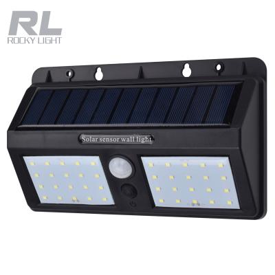 China SMD 2400mAh Li-ion Battery 40 LED Solar Powered Wall Light Solar Light With Sensor for sale