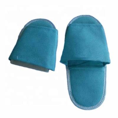 China Plane ; Hot Product Light Blue Folding Airplane Traveling Nonwoven Slippers Travel Slippers for sale