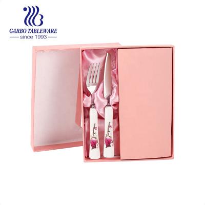 China Viable Flatware Porcelain Handle Stainless Steel Fork And Knife Gift Promotional Cutlery Serving Fish Fork for sale