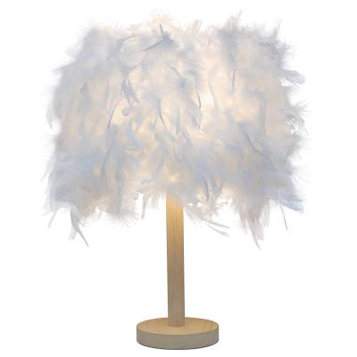 China 2021 Modern Modern Nordic Minimalist Style Feather Table Lamp For Bedroom Hotel Room Living Room Restaurant Decorative for sale