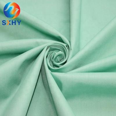 China Viable Wholesale Summer 40*40+40D 133*72 125gsm Poplin Pants Uniform Fabric 97 Cotton 3 Spandex Fabric for sale