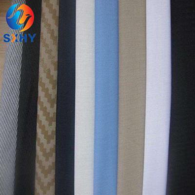 China Waterproof high quality poplin woven fabric polyester cotton TC65/35 45*45 133*72 115gsm shirt dyed fabric for sale