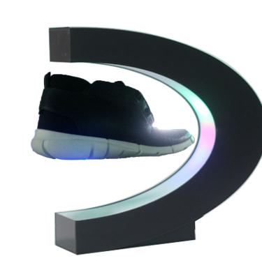 China Advertising System Levitating Shoe Display Bottom Hanging Shoe Beer Phone Cosmetic Business Card Show Magnetic Levitation Floating Display Device for sale