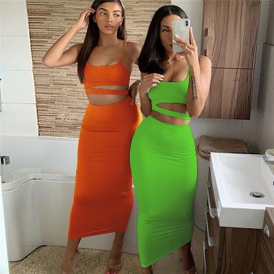 China Women 2020 summer fashionable clothing QUICK DRY 2 piece outfit two piece sets hollow out crop top and maxi skirt for sale