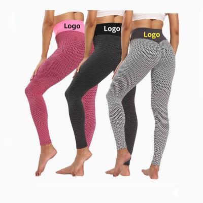 China Breathable Hot Selling Women's Female Stitching Elastic Crac! crack! high running tight sports high waist fitness nine point gaiters for sale