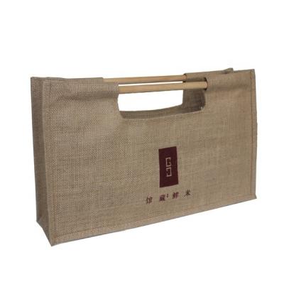 China Wooden Handle Handled Style Natural Jute Shopping Bag for sale