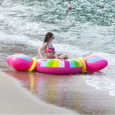 China Outdoor Water Fun PVC Custom Inflatable Colorful Candy Portable Inflatable Pool Float For Water Party Game for sale