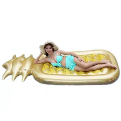 China Women Water Play Equipment Water Float Bed Summer Vacation Pineapple Inflatable Golden Pool Float for sale