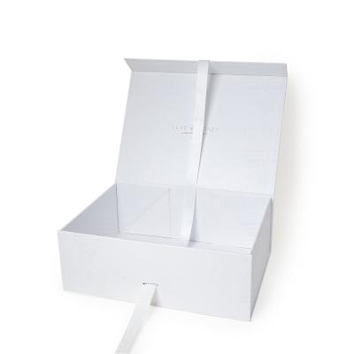 China Recyclable Custom Logo White Cardboard Magnetic Gift Folding Apparel Box For Clothes Shirt Skin Care Makeup for sale