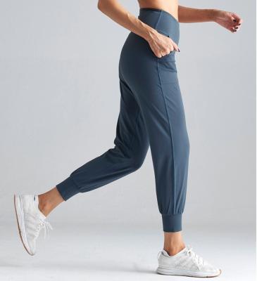 China slim fit Anti-wrinkle butt lift private label slapped sports tracksuit high waist elastic sweatpants in stock for sale