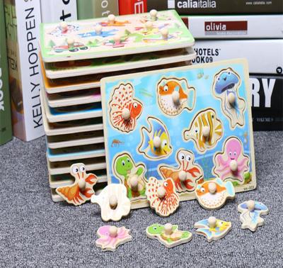 China Wooden cartoon toy 3D early education puzzle toys hand hold board puzzle baby intelligence development puzzle for sale