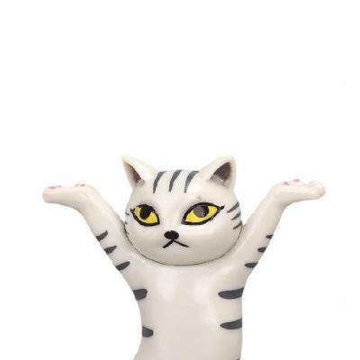 China 2021 New Hot-selling Cartoon PVC Cat Toy Christmas Gift Can Support Pen Toy Cute Cat Desktop Decoration for sale