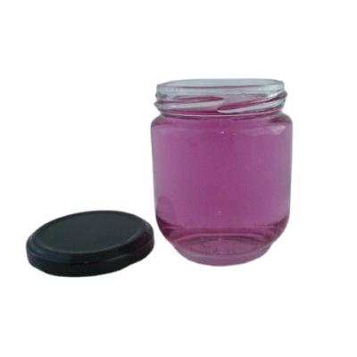 China unique glass jars for honey bottle with metal cap lids for sale