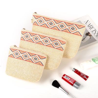 China Fashion OLEI cosmetic bag set hot sale straw artificial makeup bags pp portable lightweight travel cosmetic bag for sale