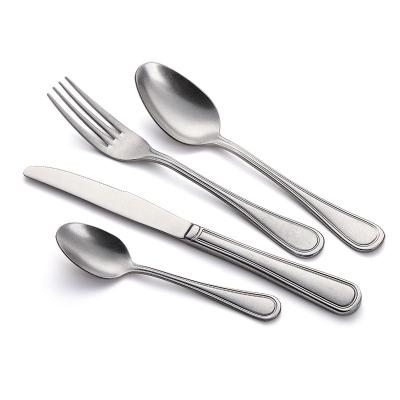 China Guangdong Sustainable High End Hanging Flatware Hand Forged Hammered Steel Cutlery Set for sale