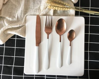 China 24 Piece Royal Titanium Plated Flatware Viable Matte Rose Gold And White Cutlery for sale