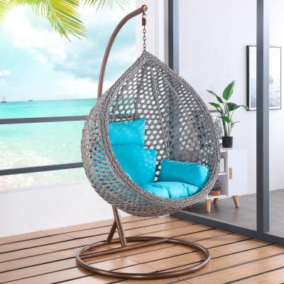 China Modern Hot Selling Modern Indoor Outdoor Plastic Rattan Garden Furniture Adult Egg Swing Hanging Chair With Stand for sale