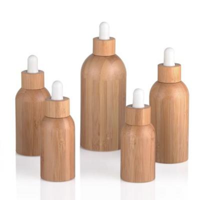 China 5ml 15ml 30ml 50ml 100ml Eco-friendly Body Hair Cosmetic Essential Oil Dispenser Bamboo Glass Bottle With Bamboo Dropper for sale