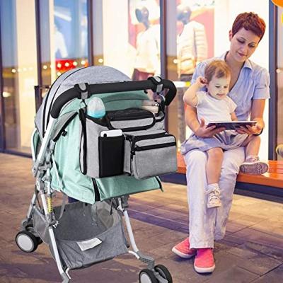 China Single Pack Stroller Organizer Bag Waterproof Universal Non-Slip Baby Stroller Bag with Detachable Clutch Bag and Shoulder Strap for sale