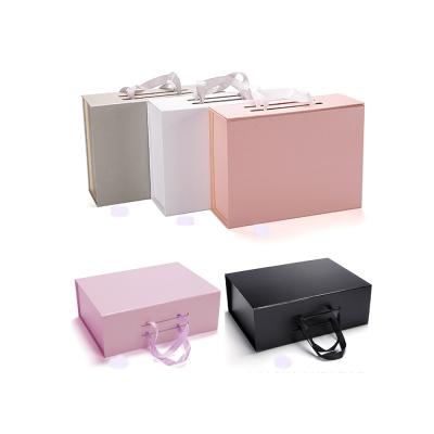 China Recyclable Custom Printed Pink Corrugated Cardboard Paper Gift Boxes Magnetic Packaging Boxes With Logo for sale