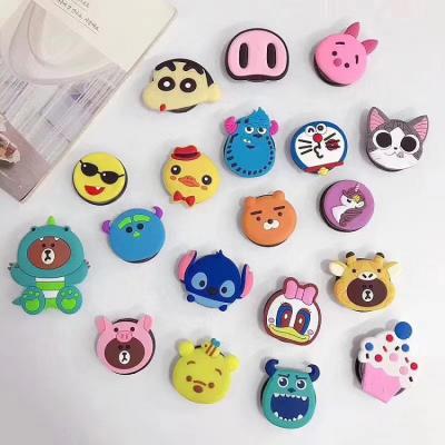 China Custom Cute Adjustable Size Cartoon Silicon Bracket Mobile Phones Accessories Phone Stand Cell Phone Ring Holder for sale