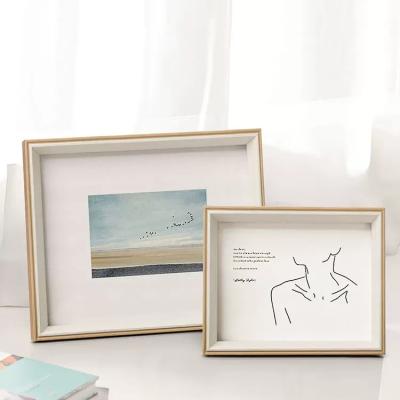 China Creative Hollow Combination Small Picture Frames Custom Logo MDF Wooden Triptych Frame for sale