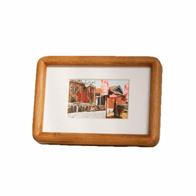 China Simplicity Style Small Picture Frames Natural Wooden Photo Frames Tabletop With Bracket for sale