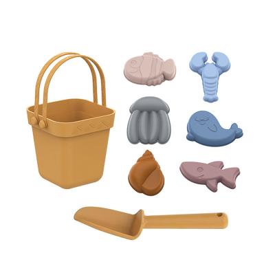 China 100% eco-friendly summer outdoor toys include beach sand bucket fruit mold silicone eco-friendly funny beach sand toys set for kids with bucket for sale