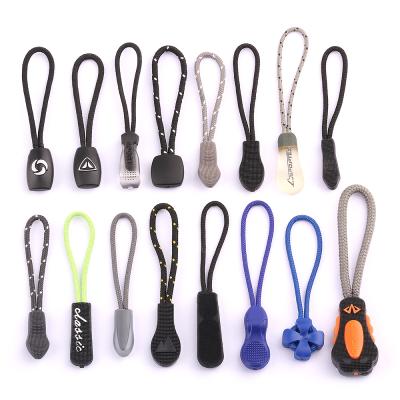 China Wholesale Customized Logo Reversible printed PVC zipper puller puller puller manufacturer for clothing zipper tags for bags for sale