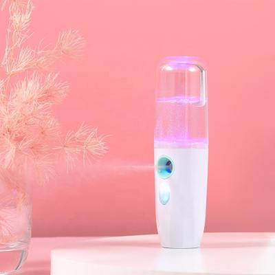 China Moisturizer Mini Spray Beauty Facial Steamer Portable Face Humidifier Handheld Nano Mist Sprayer for sale