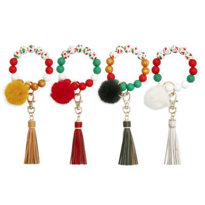 China Souvenir Gifts Promotion 2021 New Arrivals Silicone Beaded Bracelet Ring Christmas Bracelet Wristlet Keychain Key Chains With Tassel Hair Bulb for sale