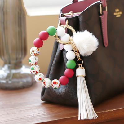 China Wholesale Fashion Souvenir Gifts Promotion Fashion Silicone Beaded Chains Ring Christmas Macrame Keychain Wristlet Key Bracelet for sale