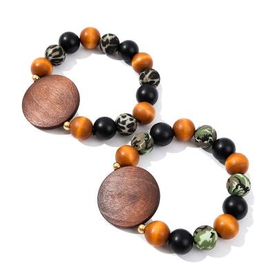 China Souvenir Gifts Promotion 2021 New Fashion Hot Sale Vintage Leopard Bohemian Silicone Beads Wooden Bead Bracelet Wooden Disc for sale