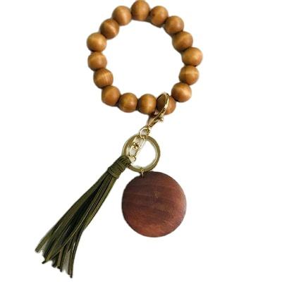 China New Arrivals Promotion Souvenir Gifts Fashion Key Ring Key Holder Bracelet Key Chain Bead Wooden Bracelet With Tassel And Disc for sale