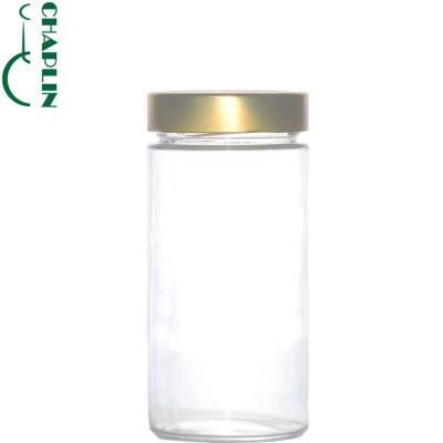 China Freshness Preservation Round Glass Bottles Glass Food Jars With Black Tin Metal Lid For Honey Candy Packaging for sale