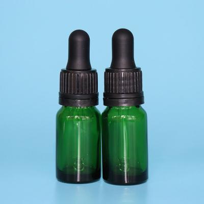 China Personal care 30ml personal care essential oil glass bottle green color dropper bottle e liquid essential oil bottle for sale