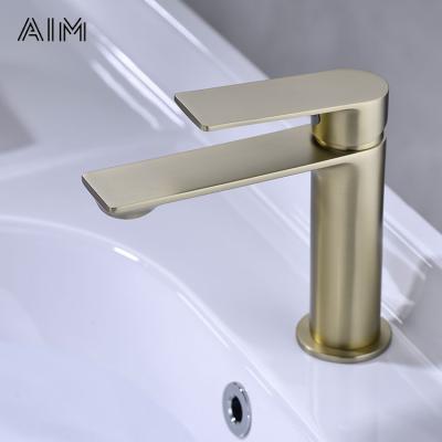 China Metered Faucets Brushed Gold Basin Mixer Single Hole Deck Mounted Brass Faucet Factory Price for sale