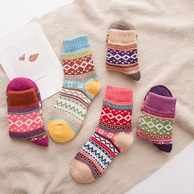 China Breathable Thick Warm Cross Flower Needle Sheep Twat Rabbit Mid-Calf Length Woolen Socks For Women for sale