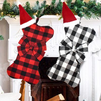 China European Personalized Christmas Cartoon Hat Stocking Buffalo Plaid Dog Bone Shape Christmas Hanging Stocking for sale