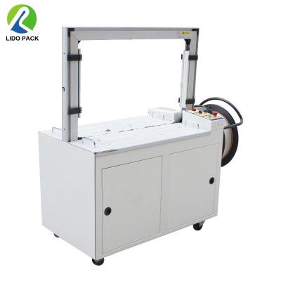 China Full Automatic Food Packing Machine Polypropylene PP Band Strap Cardboard Box Strapping Machine for sale