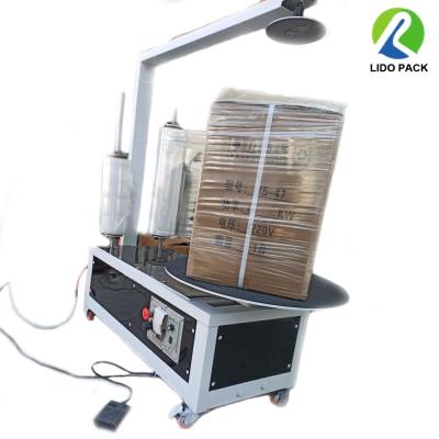 China Semi automatic mini food wrap film machine for small carton box stretch plastic film wrapping machine for sale