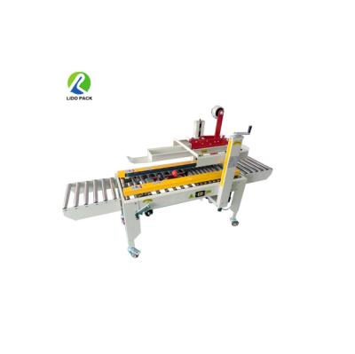 China Automatic Food Crate Tape Sealing Machine Electric Tape Making Machine for sale