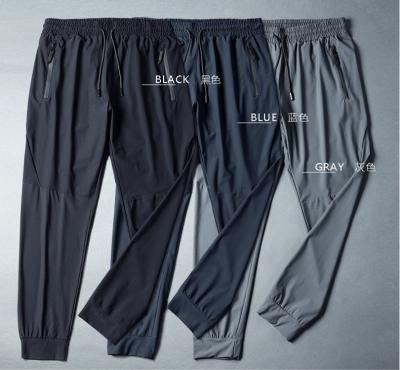 China Quick-Drying Breathable Sports Pants Leisure Ice Silk Stretch Breathable Running Pants Fitness Pants Men's Sports Fitness Yoga Pants for sale