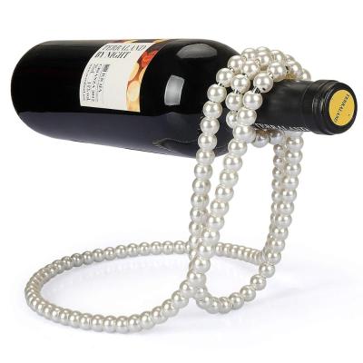 China Viable Artificial Pearl Collar Wine Rack Metal Wine Bottle Holder Floating Display Stand for Bars and Home Decoration for sale